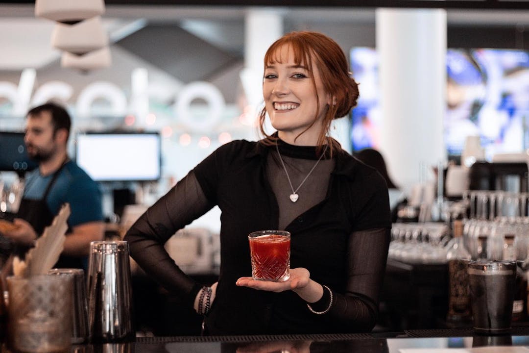 Bartender Holding Cocktail